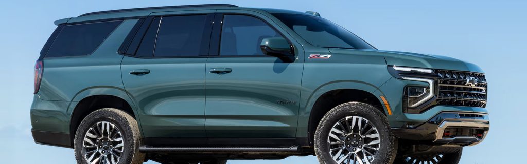 A Chevrolet SUV in green, showcasing rugged off-road capability.